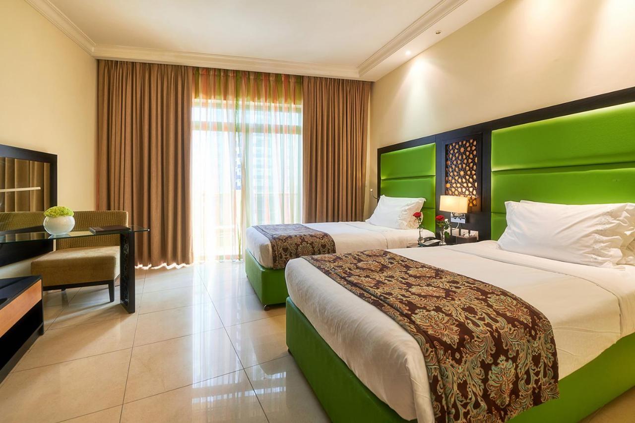 Bahi Ajman Palace Hotel Exterior photo Deluxe Room