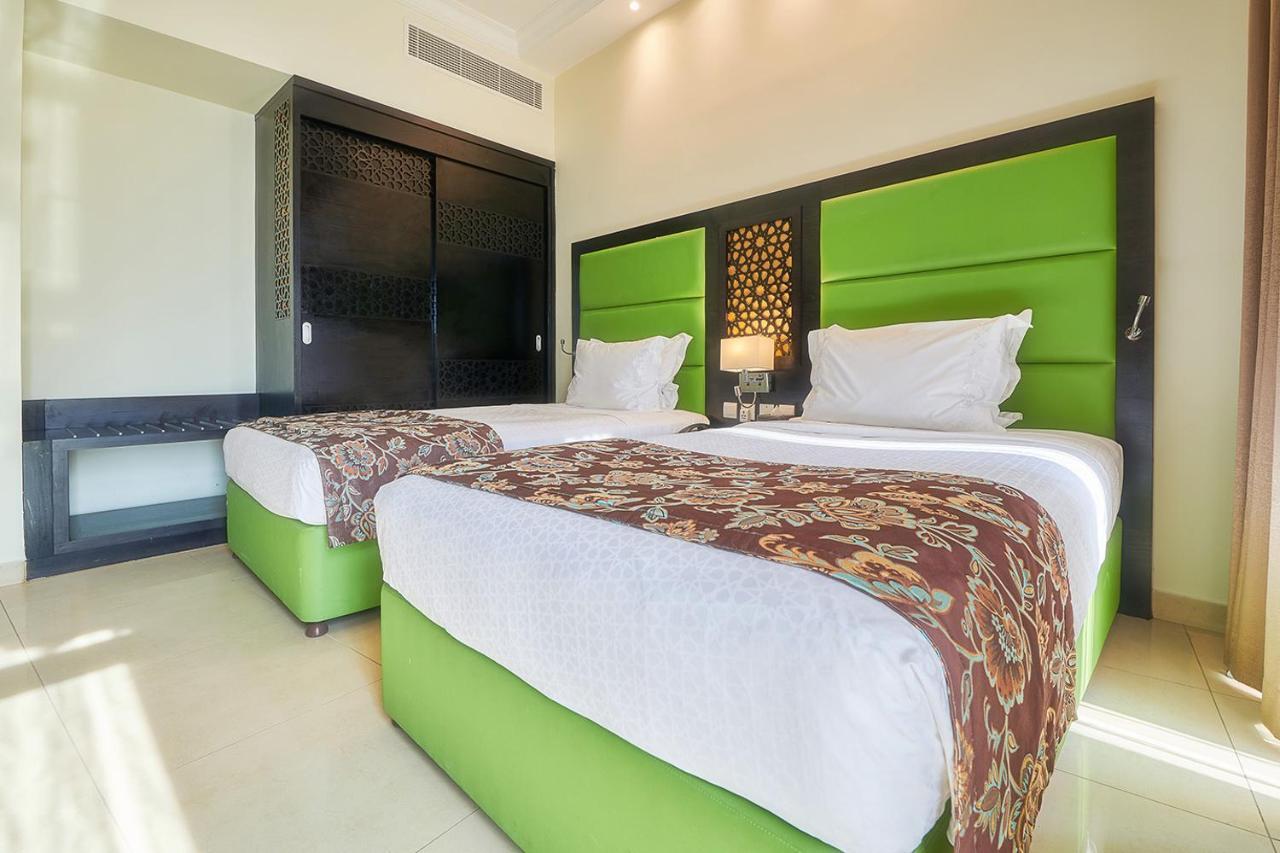 Bahi Ajman Palace Hotel Exterior photo Deluxe Room